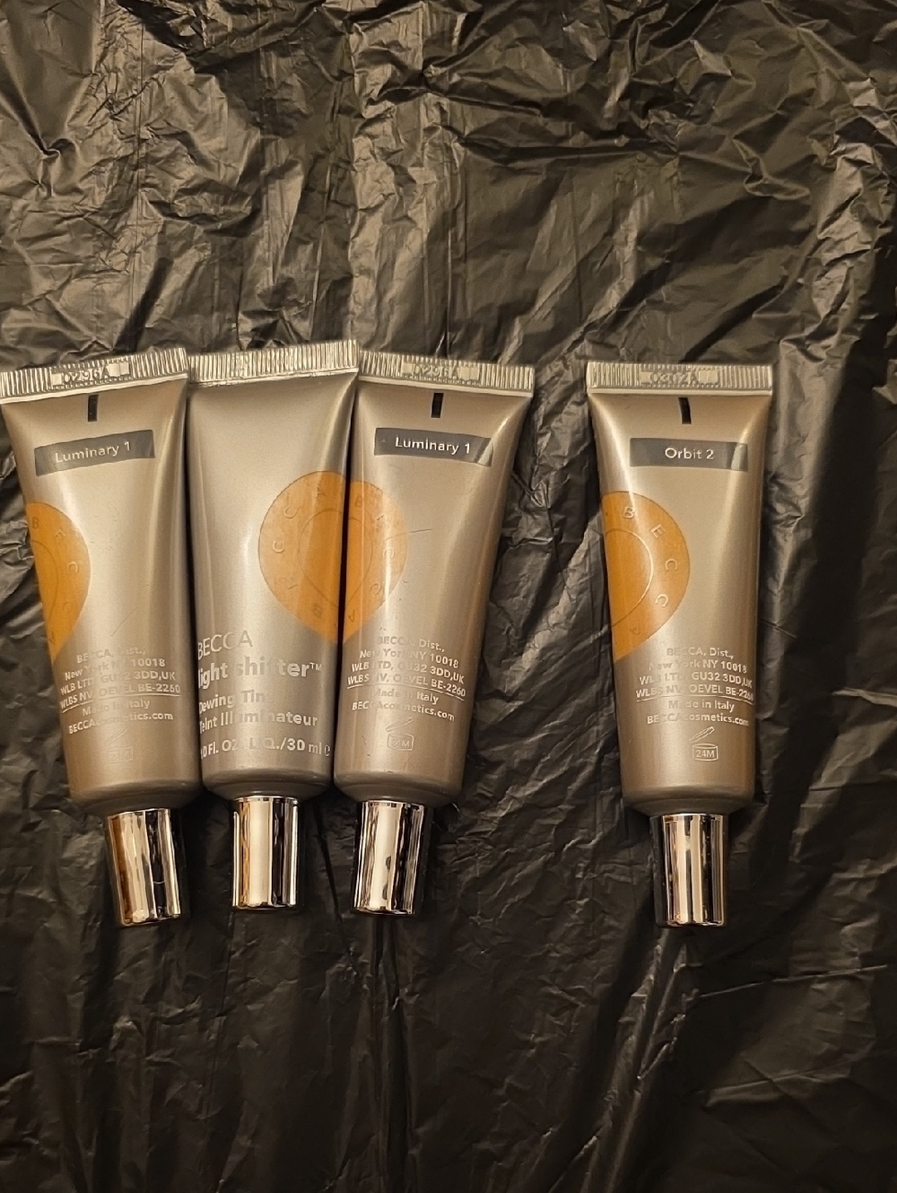 4 tubes BECCA Light Shifter Tint; 3 luminary, 1 orbit